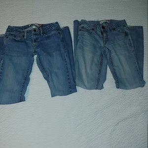 2 pairs of flare leg jeans